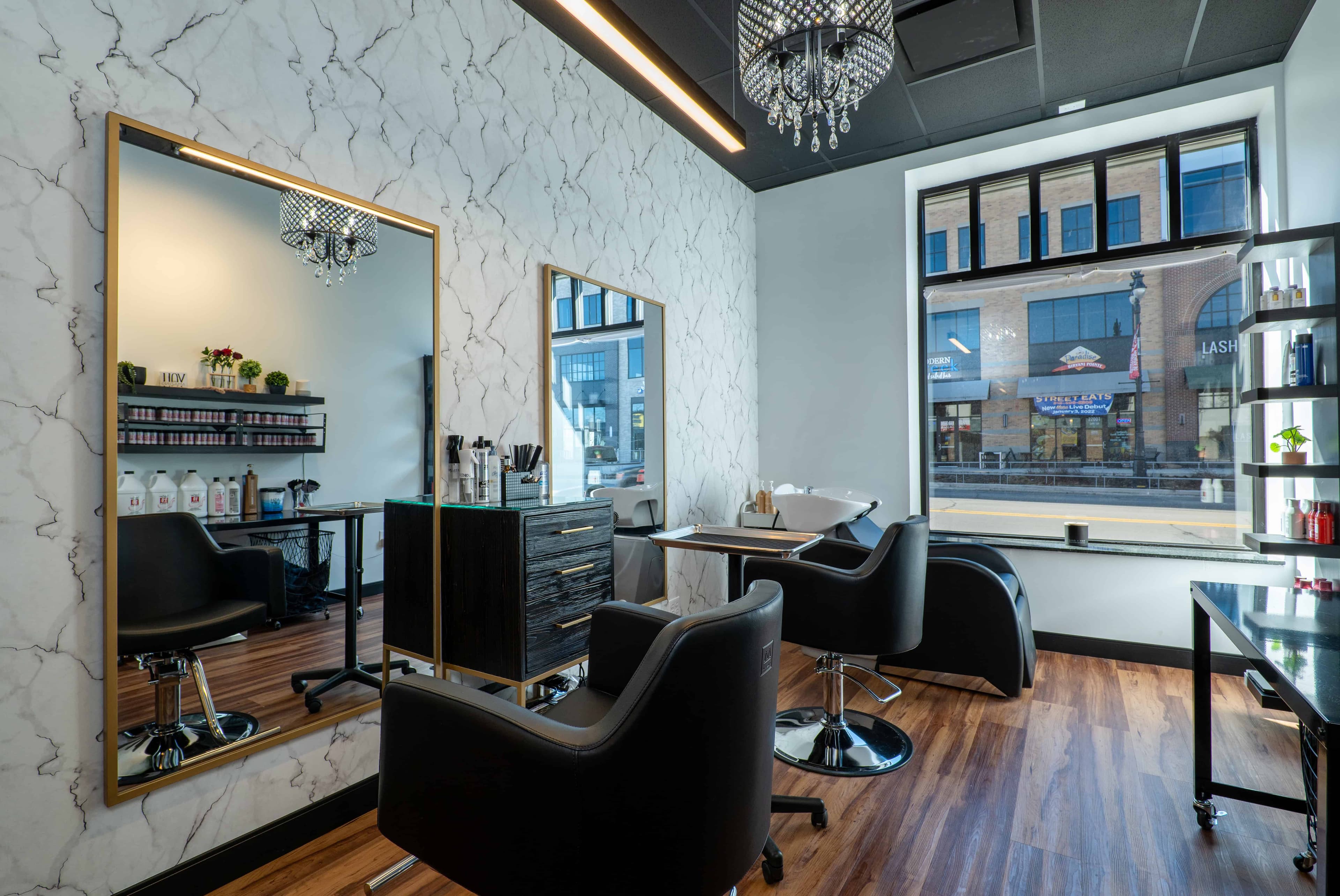 Clarkston Cosmo suite with black styling chairs