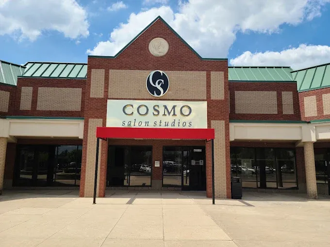 Cosmo Salon Studios storefront with red awning on Ford Road in Canton